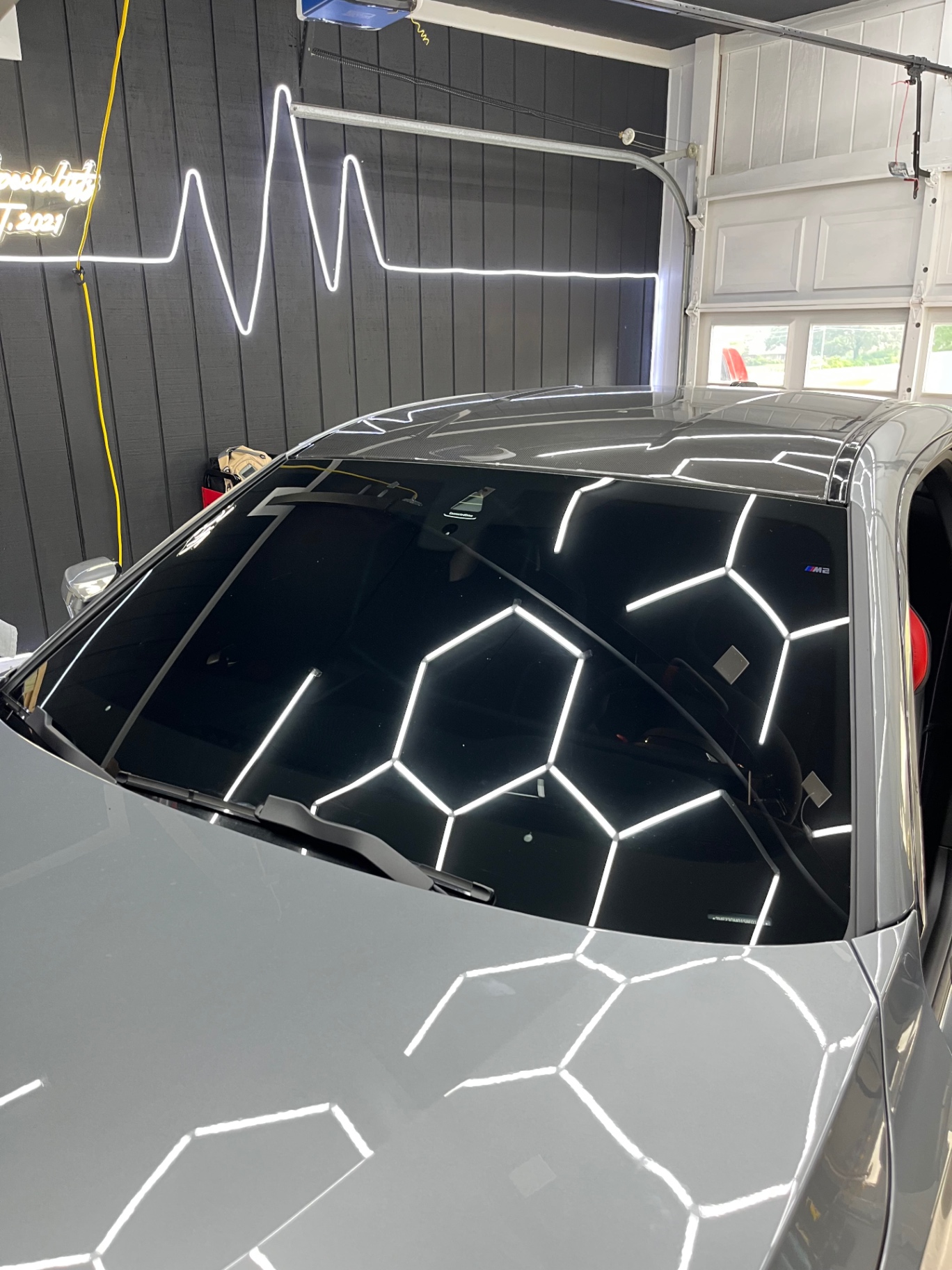 Ceramic coating and detailing on a black performance vehicle in Lawrenceville, GA